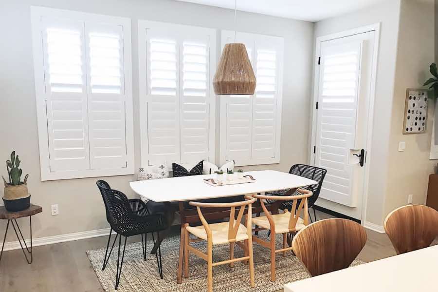 Use Polywood shutters to control natural light levels in your Tampa dining room. Polywood shutters with top louvers tilted open in a dining room
