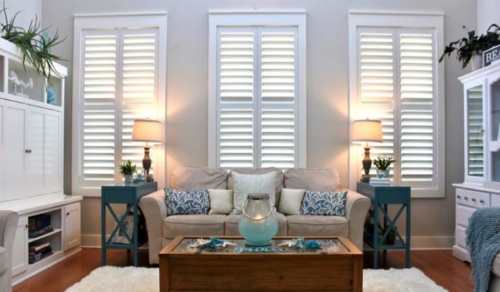 Shutter styles in Tampa can range from subtle to ultra-modern Tampa modern living room with faux wood shutters