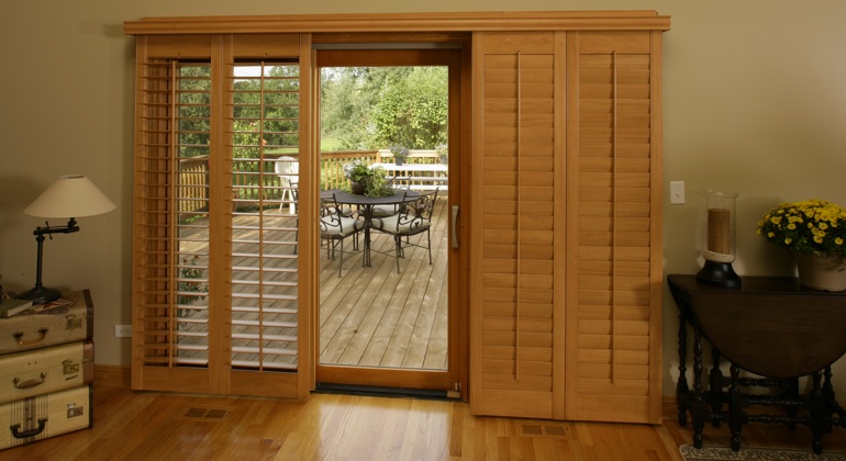 You can even match your wood shutters to your patio. Tampa wood shutter sliding door
