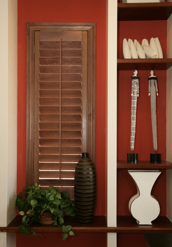 You can even match your wood shutters with shelving. Tampa wood shutter shelving