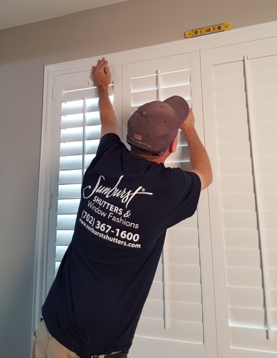 Shutter installation in Tampa bedroom.
