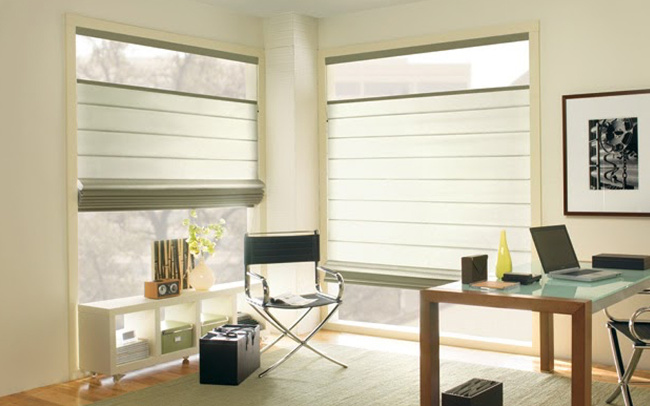 Upgrade your windows with stylish window shades or shutters in Tampa. Stylish sheer shades in the corner of a modern office.