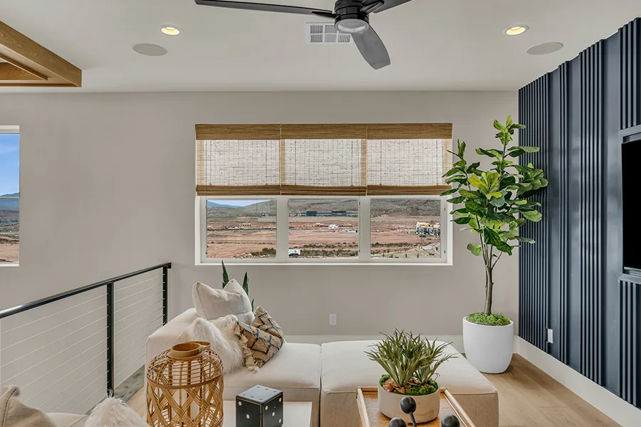 Natural brown woven shades on a window in a stylish sitting area
